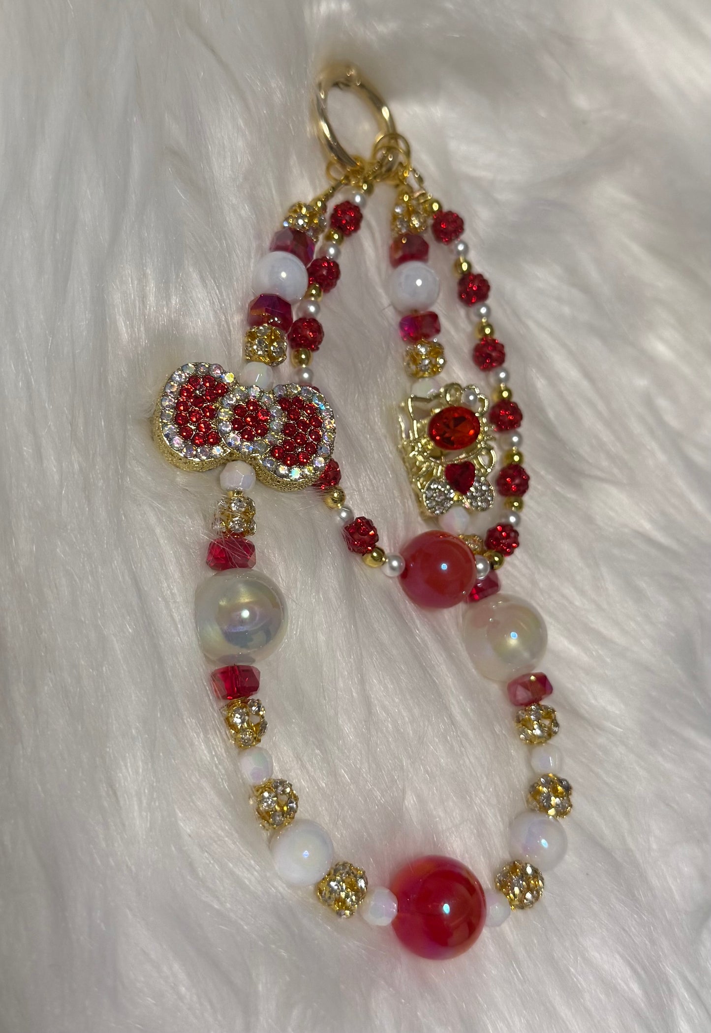 Pretty red and gold kitty & bow phone chain