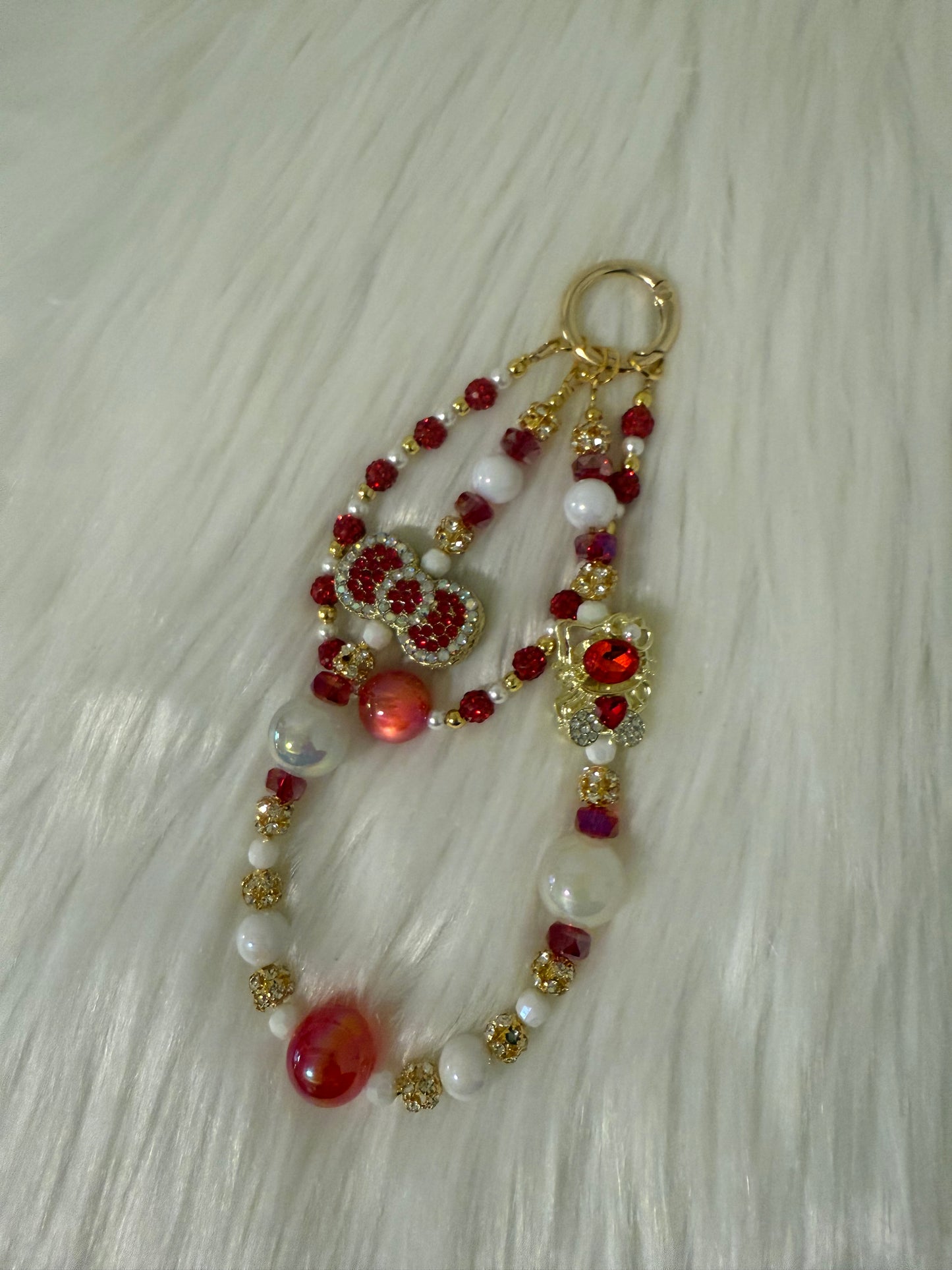 Pretty red and gold kitty & bow phone chain